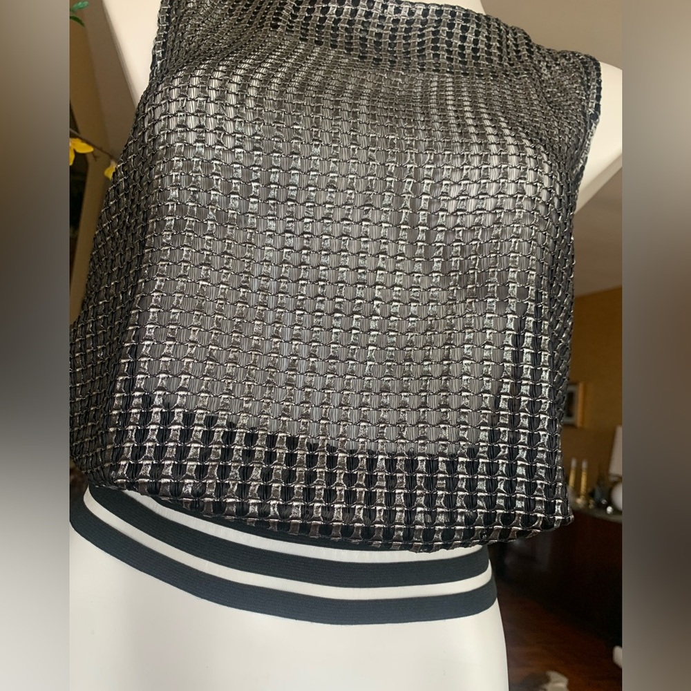 NWOT DeCo Stylish and sexy Top  SizeS. 59% Cotton 41% Polyester. Never wore